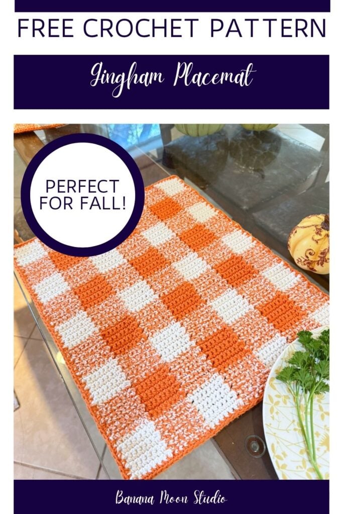 Orange and white crochet gingham placemat on a glass table top. Panels with text read: Free crochet pattern, gingham placemat, perfect for fall, banana moon studio.