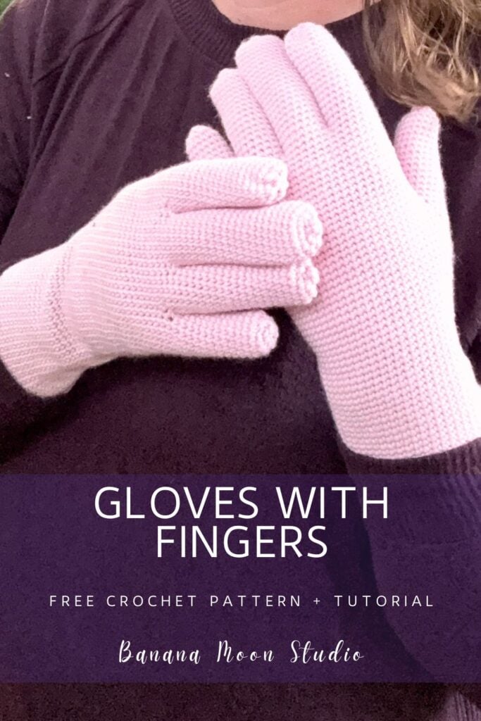 A person wearing pink crochet gloves with fingers. A panel with text reads: Gloves with fingers, free crochet pattern + tutorial, banana moon studio.