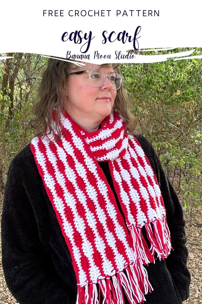 A woman stands outside wearing a striped crochet scarf over a black jacket. Panels with text read: Free crochet pattern, easy scarf, banana moon studio.